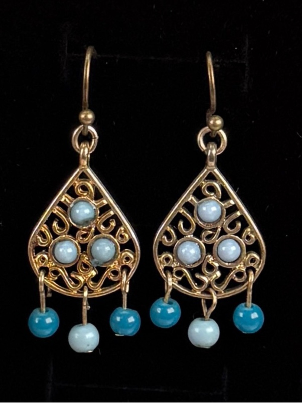 Bohemian chic breast tone and blue dangle, delicate light white pierced earrings